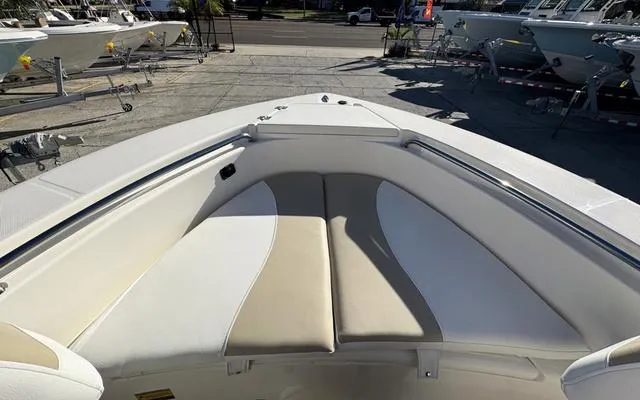 Slide: The Image of 2025 Bulls Bay 200 CC boat interior with cushioned seating and sleek design. - 27