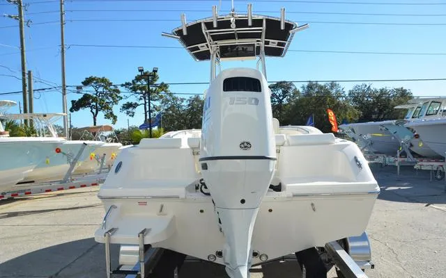 Slide: The Image of 2025 Bulls Bay 200 CC boat with outboard motor, displayed outdoors. - 6