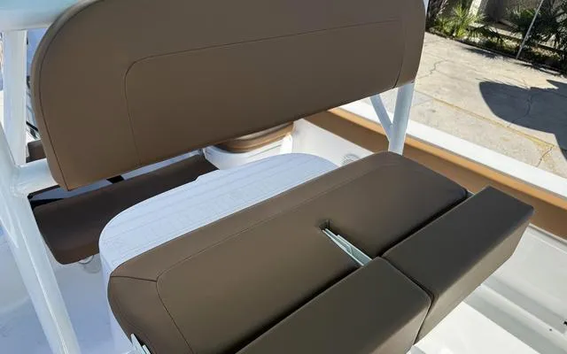 Slide: The Image of Brown seating on a 2025 Clearwater 2200 boat, showcasing modern design and comfort. - 26