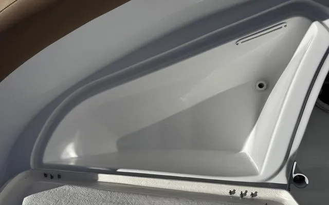 Slide: The Image of Clearwater 2200 boat storage compartment, 2025 model, featuring sleek design and durable construction. - 32