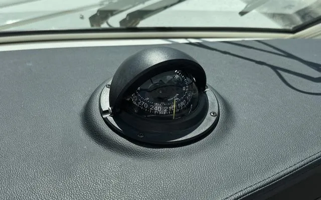 Slide: The Image of Compass on Sailfish 276 DC boat dashboard, 2025 model. - 29
