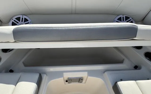 Slide: The Image of 2025 Sailfish 276 DC boat interior with seating and speakers. - 42
