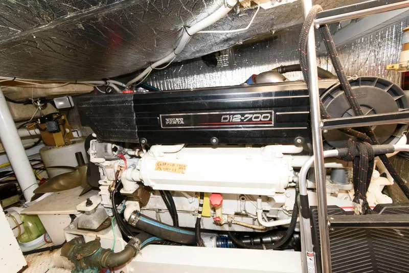Slide: The Image of Engine room of 2003 Cruisers Yachts 5370 Express with Volvo Penta D12-700 engine. - 24