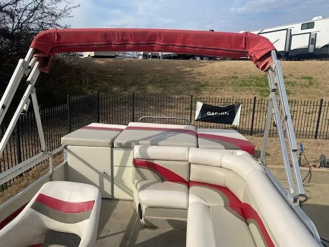 Slide: The Image of 2008 Voyager Pontoons 22 Sport Cruise with red and white seating and canopy. - 5