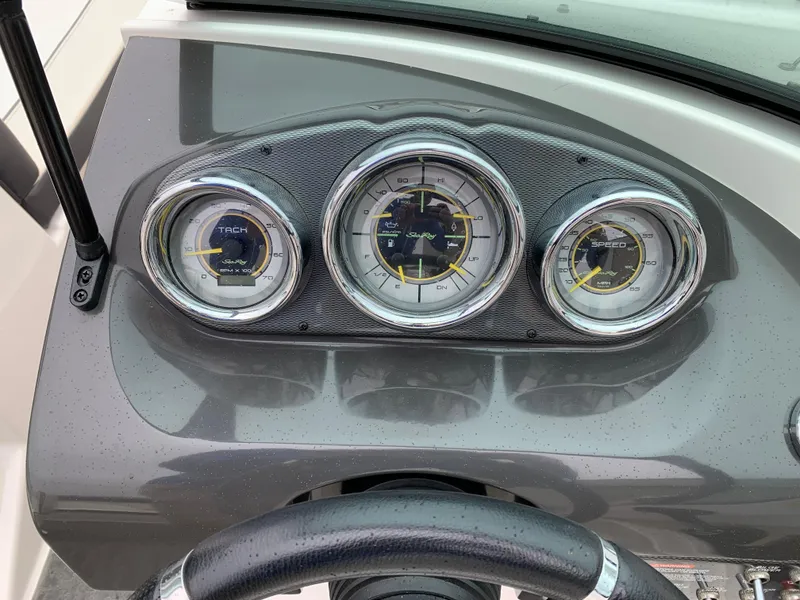 Slide: The Image of Dashboard of 2013 Sea Ray 190 Sport boat with three gauges. - 5