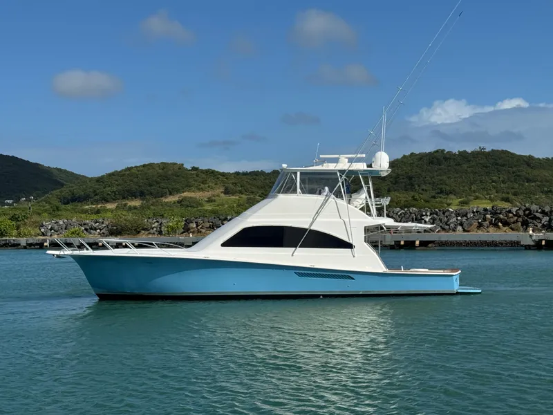 The Image of 2008 Ocean Yachts 54 Super Sport boat on calm water, scenic background. - 1