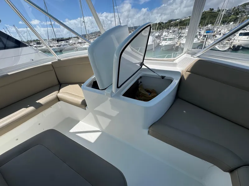 Slide: The Image of 2008 Ocean Yachts 54 Super Sport interior with seating and storage, docked at marina. - 41
