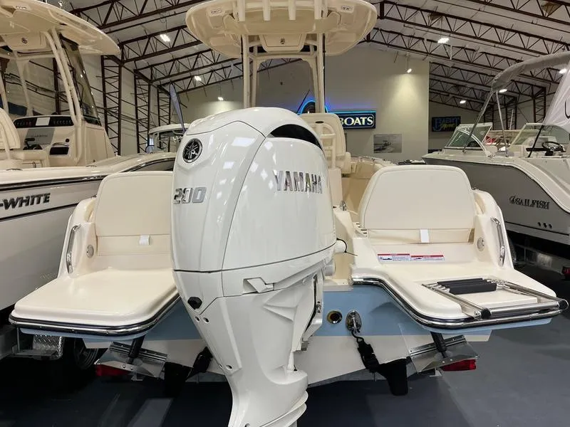 Slide: The Image of 2025 Grady-White Fisherman 216 boat with Yamaha 210 engine in showroom. - 10