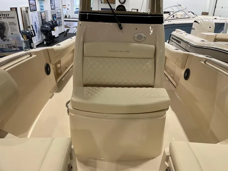 Slide: The Image of 2025 Grady-White Fisherman 216 boat interior with cushioned seating. - 13