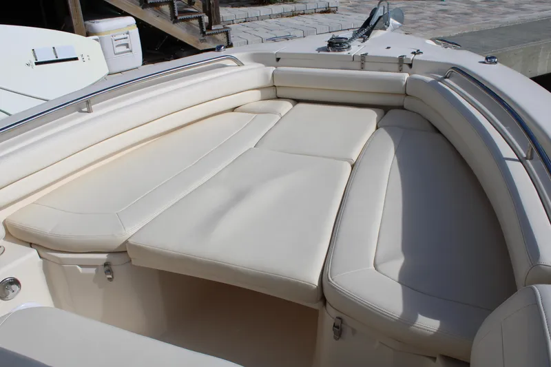 Slide: The Image of 2018 Grady-White Fisherman 257 boat with spacious cushioned seating area. - 17