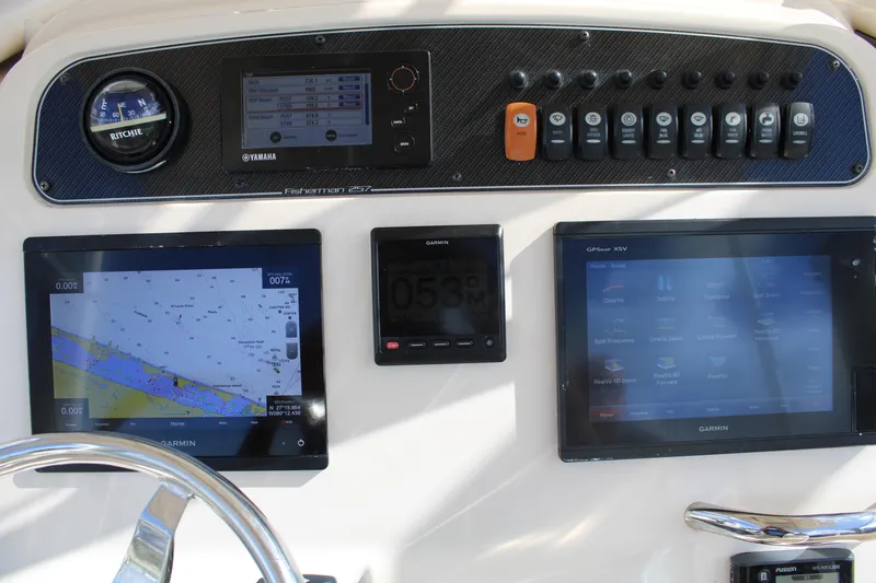 Slide: The Image of Control panel of 2018 Grady-White Fisherman 257 boat with navigation screens and controls. - 31