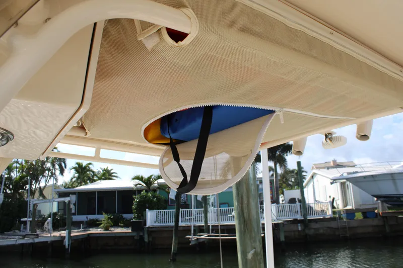 Slide: The Image of 2018 Grady-White Fisherman 257 boat with storage netting under the canopy. - 35