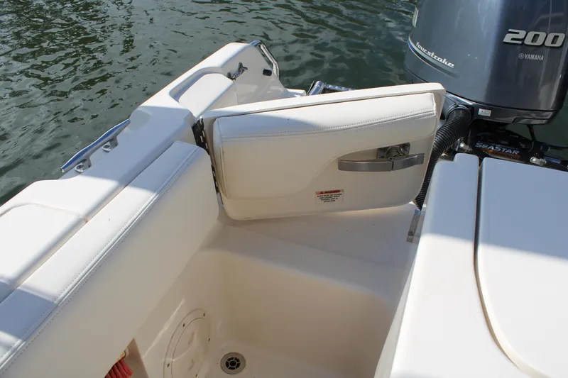 Slide: The Image of 2018 Grady-White Fisherman 257 boat interior with open transom door and Yamaha 200 engine. - 41