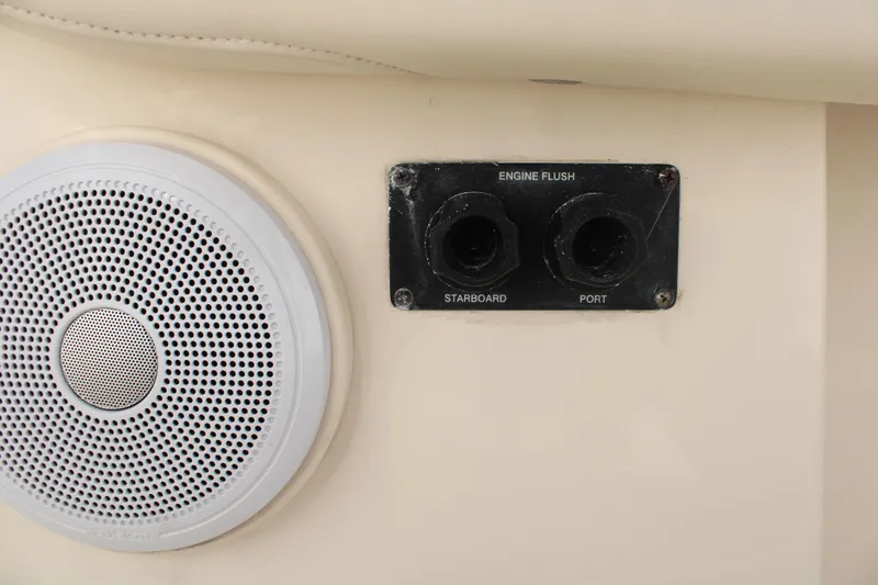 Slide: The Image of 2018 Grady-White Fisherman 257 boat speaker and engine flush ports. - 46