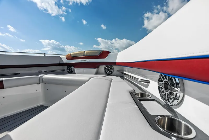 Slide: The Image of 2023 Formula 430 Super Sport Crossover interior with luxurious seating and cup holders. - 19