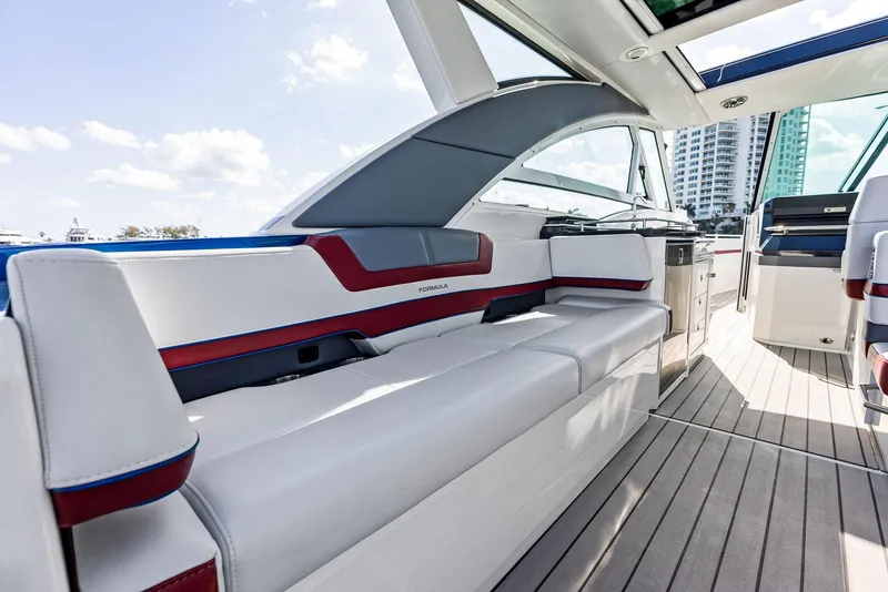 Slide: The Image of 2023 Formula 430 Super Sport Crossover interior with sleek seating and modern design. - 22