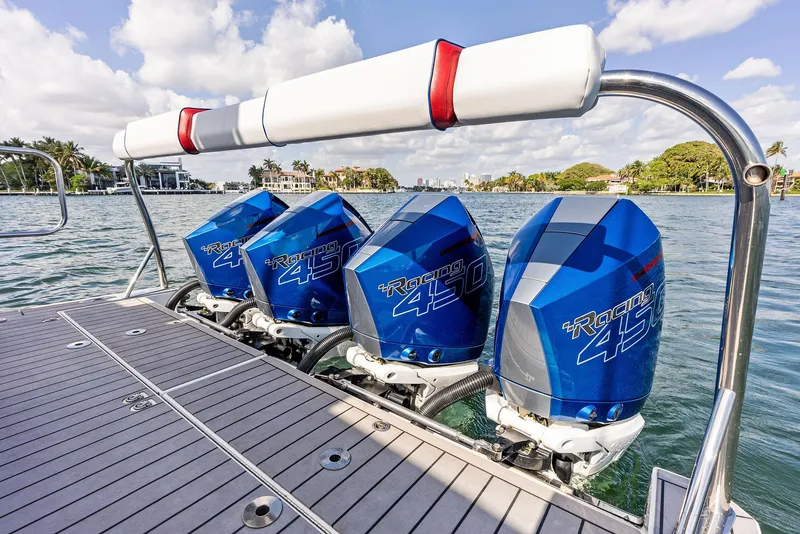 Slide: The Image of 2023 Formula 430 Super Sport Crossover with quad Mercury 450R outboard engines on a sunny day. - 31