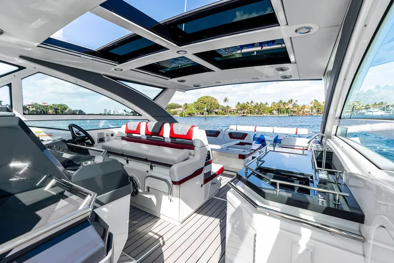 Slide: The Image of 2023 Formula 430 Super Sport Crossover yacht interior with luxurious seating and panoramic views. - 32