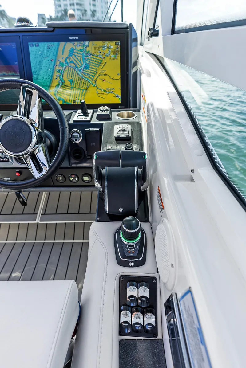 Slide: The Image of 2023 Formula 430 Super Sport Crossover helm with navigation display and controls. - 36