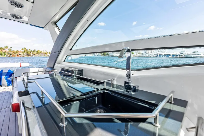 Slide: The Image of Luxury yacht kitchen area on 2023 Formula 430 Super Sport Crossover, featuring sleek design and ocean view. - 37