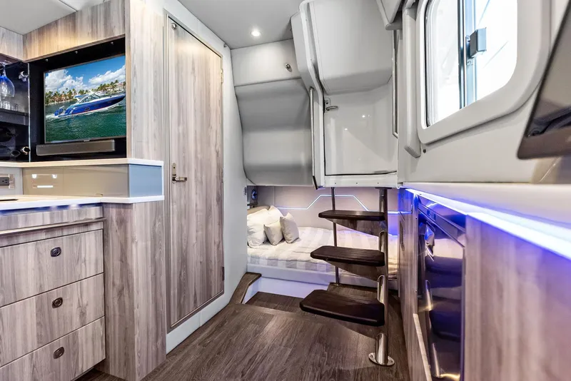 Slide: The Image of Interior of 2023 Formula 430 Super Sport Crossover, featuring modern design and luxurious amenities. - 40