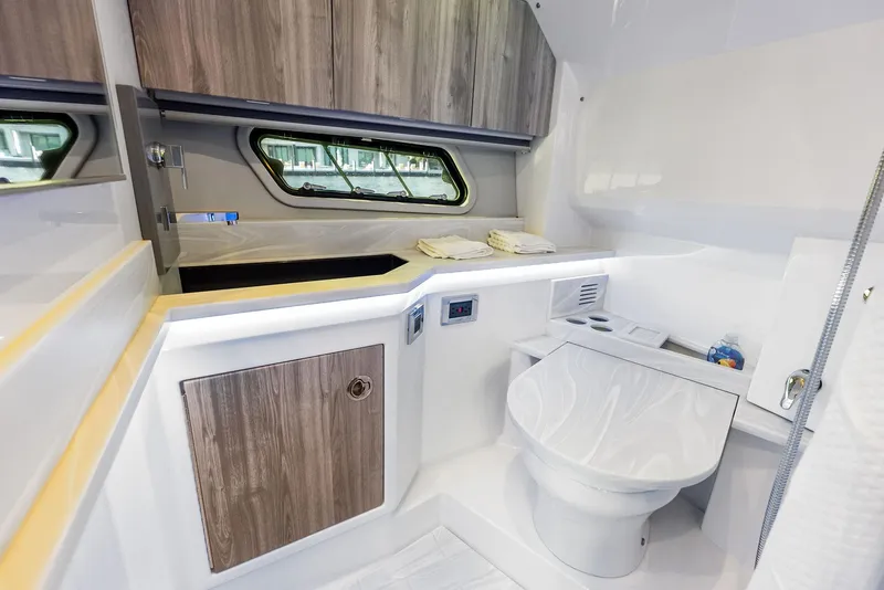 Slide: The Image of 2023 Formula 430 Super Sport Crossover bathroom with modern design and wood accents. - 47