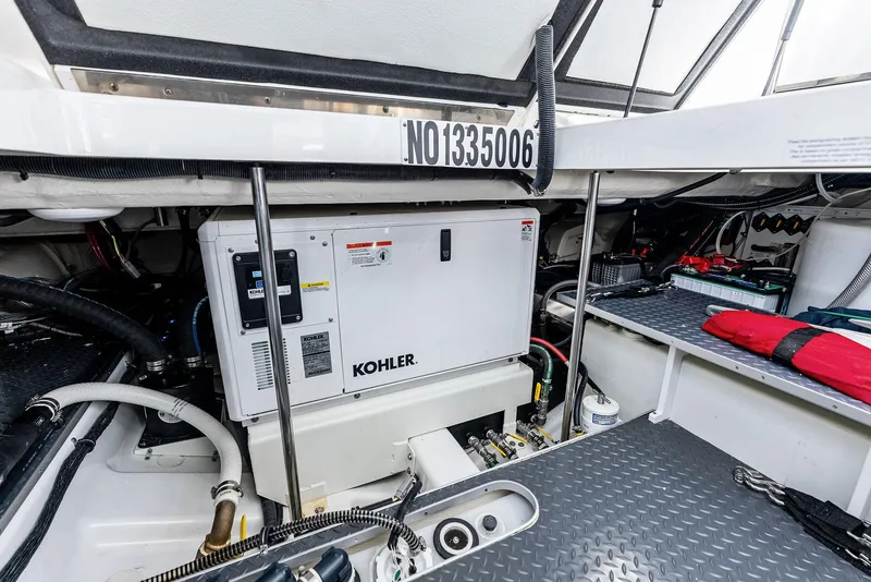 Slide: The Image of Engine room of 2023 Formula 430 Super Sport Crossover with Kohler generator. - 48