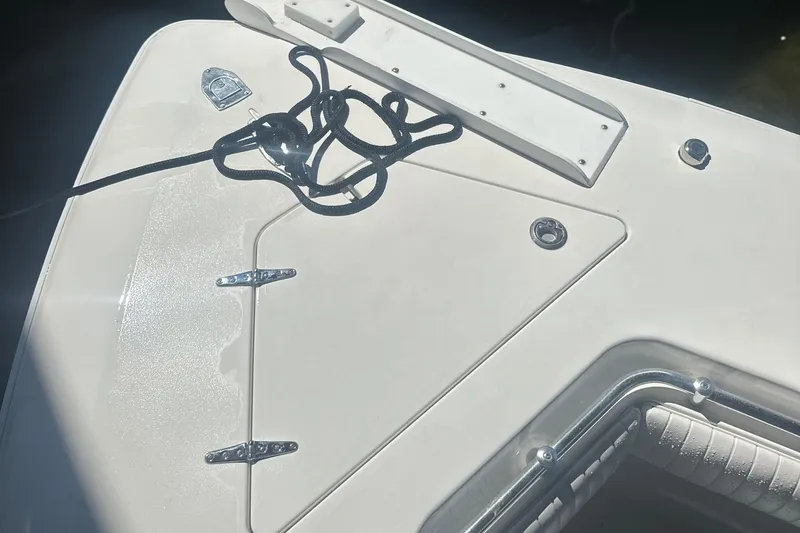 Slide: The Image of 2008 Contender 32 Tournament boat deck with rope and hatch. - 33