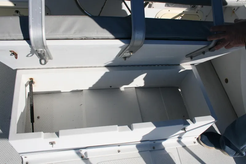 Slide: The Image of Open storage compartment on a 1992 Sea Sport Sea Master 2700 boat. - 15