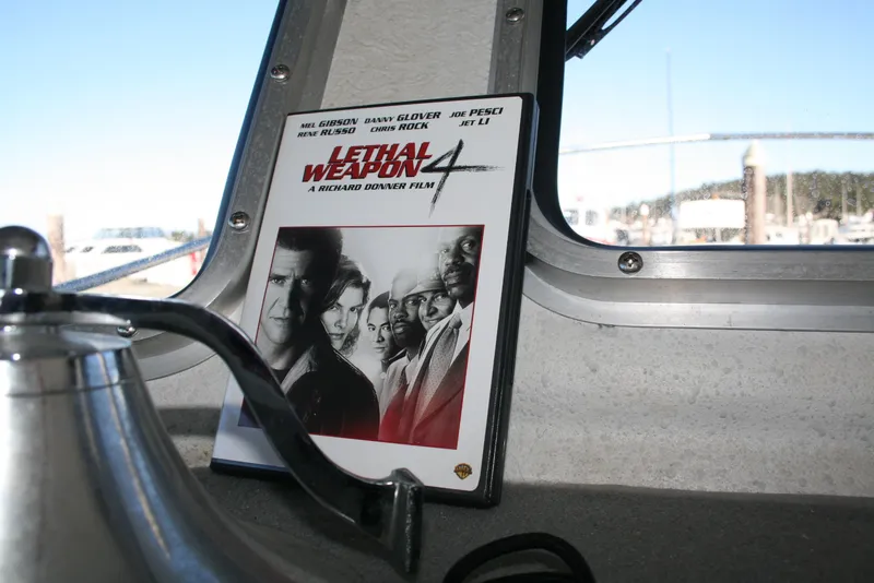 Slide: The Image of DVD of "Lethal Weapon 4" on a 1992 Sea Sport Sea Master 2700 boat. - 6