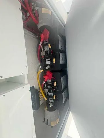 Slide: The Image of 2025 Sportsman Heritage 261 boat interior with dual seats and modern dashboard. - 20