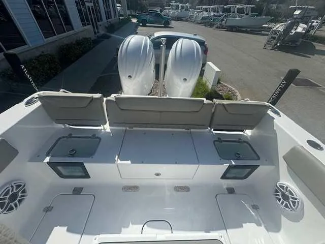 Slide: The Image of 2025 Sportsman Heritage 261 boat engine compartment with visible filters and hoses. - 39