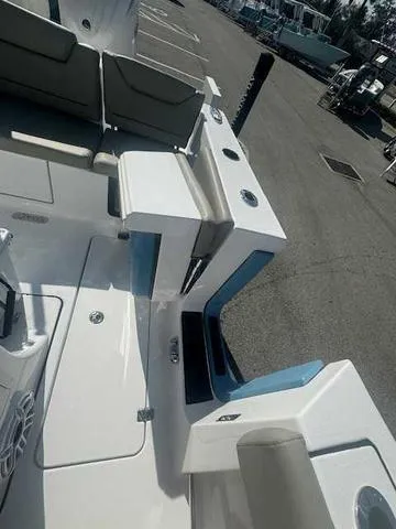 Slide: The Image of Control panel of 2025 Sportsman Heritage 261 boat with speaker. - 49