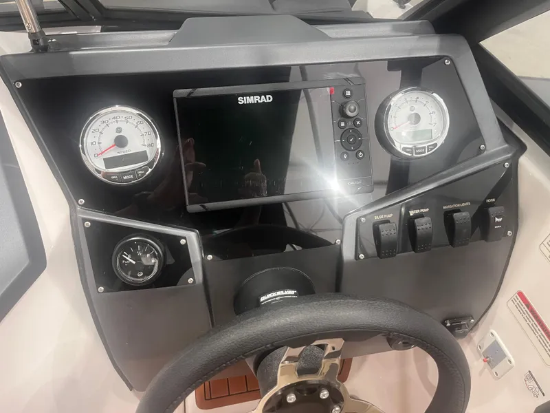 Slide: The Image of Dashboard of 2025 Ventura 195 Crossover boat with Simrad display and gauges. - 47