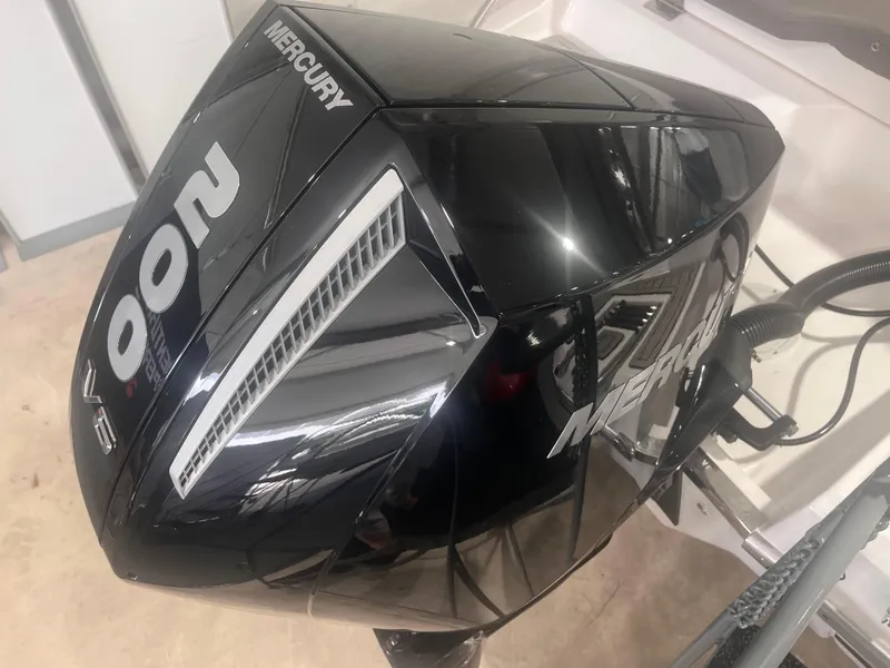 Slide: The Image of Black Mercury outboard motor on a 2025 Ventura 252 Comfort boat. - 5