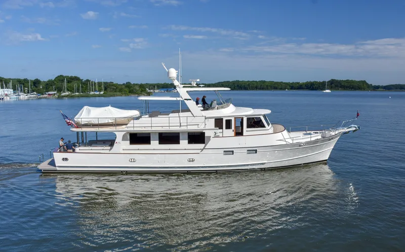 The Image of Fleming 78 yacht cruising on a calm lake, 2020 model, under clear blue skies. - 0