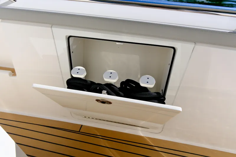 Slide: The Image of Storage compartment on 2023 Tiara Yachts 48 LS, featuring sleek design and practical functionality. - 39