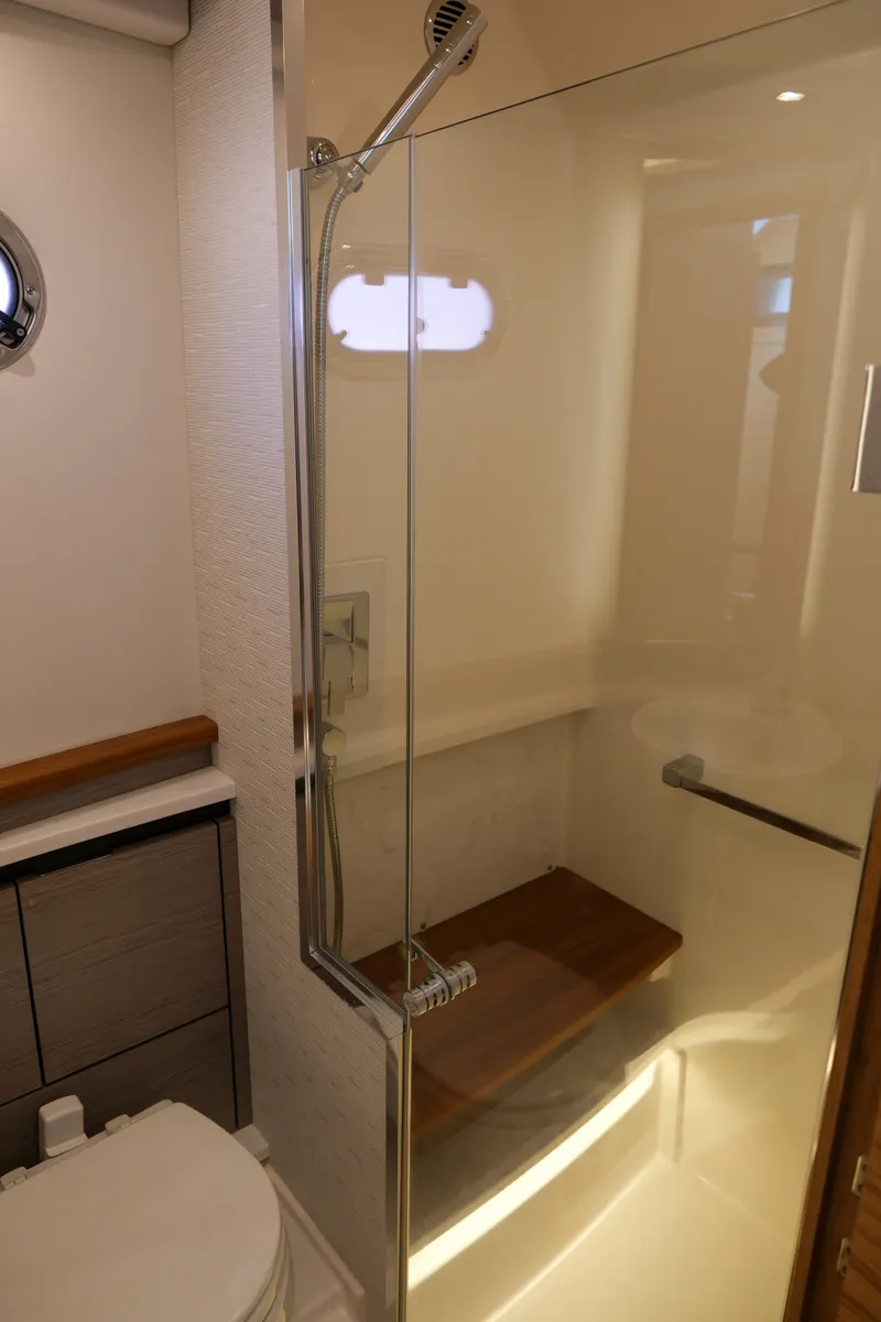 Slide: The Image of 2023 Tiara Yachts 48 LS bathroom with modern shower and sleek design. - 50
