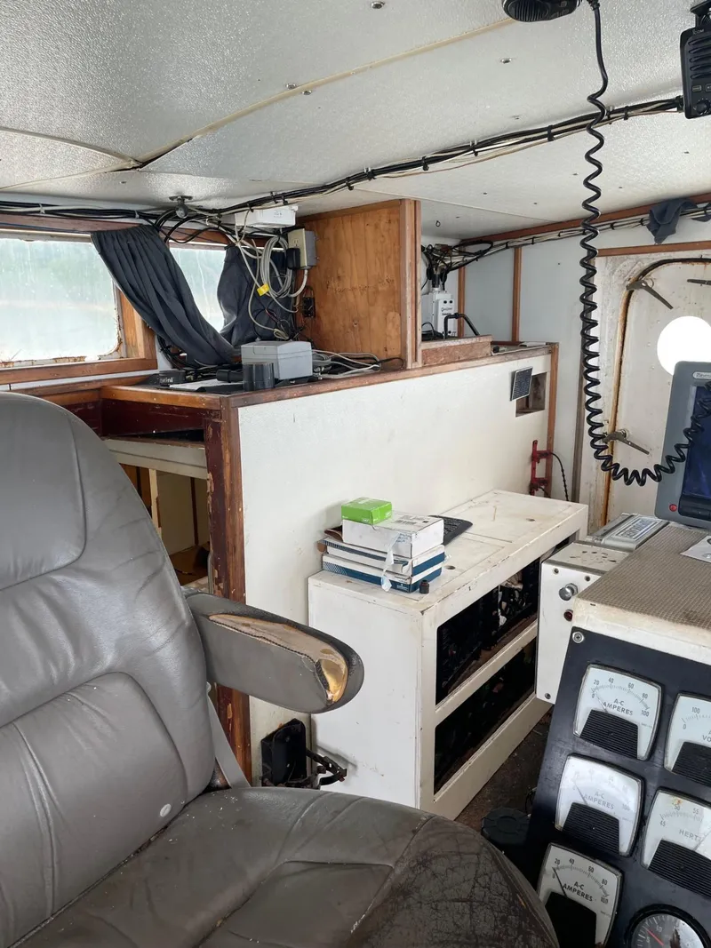 Slide: The Image of Interior of a 1983 commercial freezer trawler's control room with navigation equipment. - 13