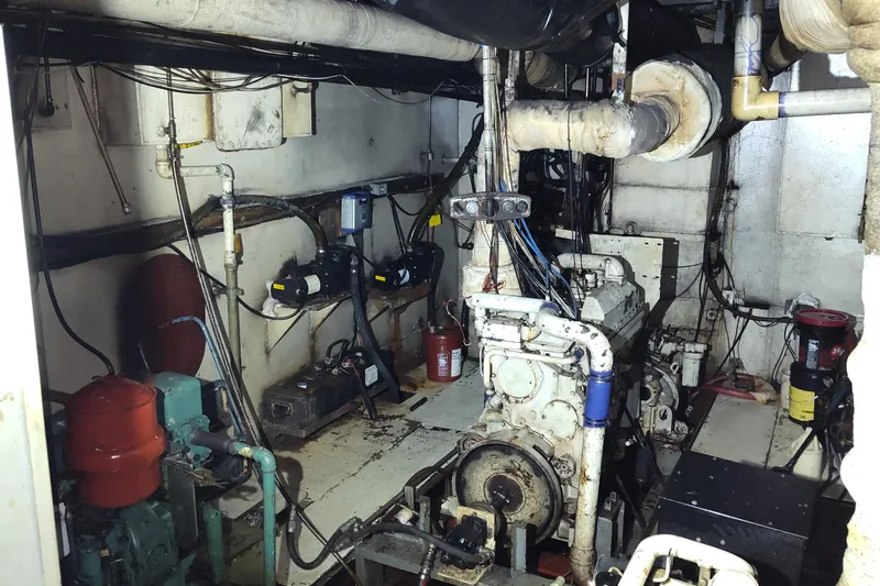Slide: The Image of Interior of a 1983 commercial freezer trawler with basic amenities and storage space. - 3
