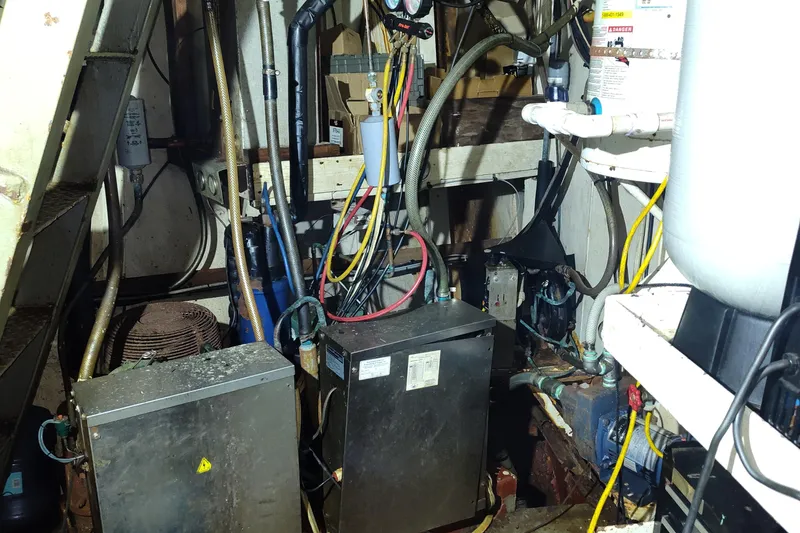 Slide: The Image of Engine room of a 1983 Commercial Freezer Trawler, showcasing machinery and components. - 6