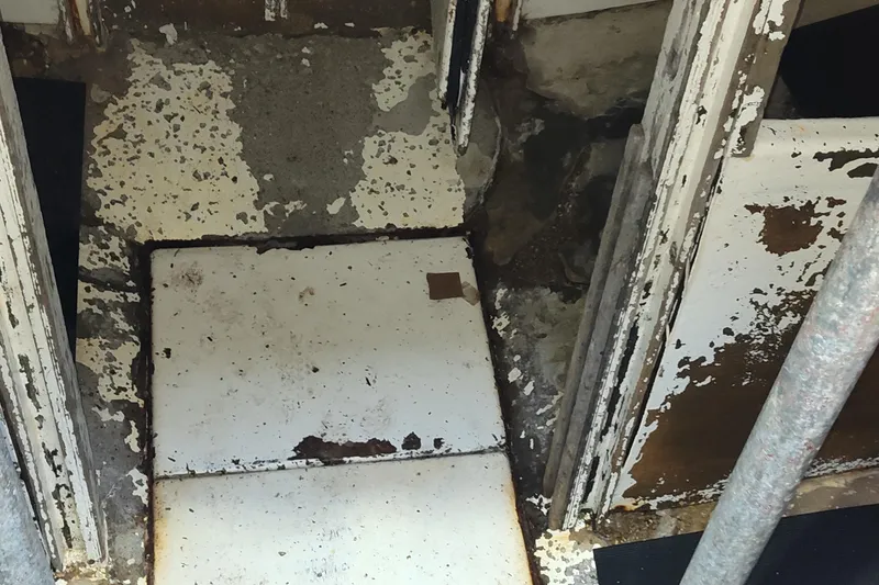 Slide: The Image of Interior of a 1983 Commercial Freezer Trawler with electrical equipment and wiring. - 8