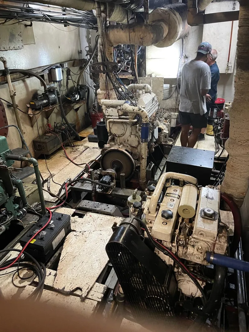 Slide: The Image of Interior of a 1983 commercial freezer trawler showing worn and peeling surfaces. - 9
