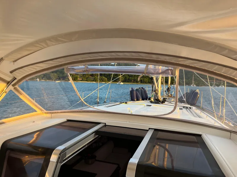 Slide: The Image of Beneteau Oceanis 58 sailboat deck view, 2011 model, on calm waters. - 3