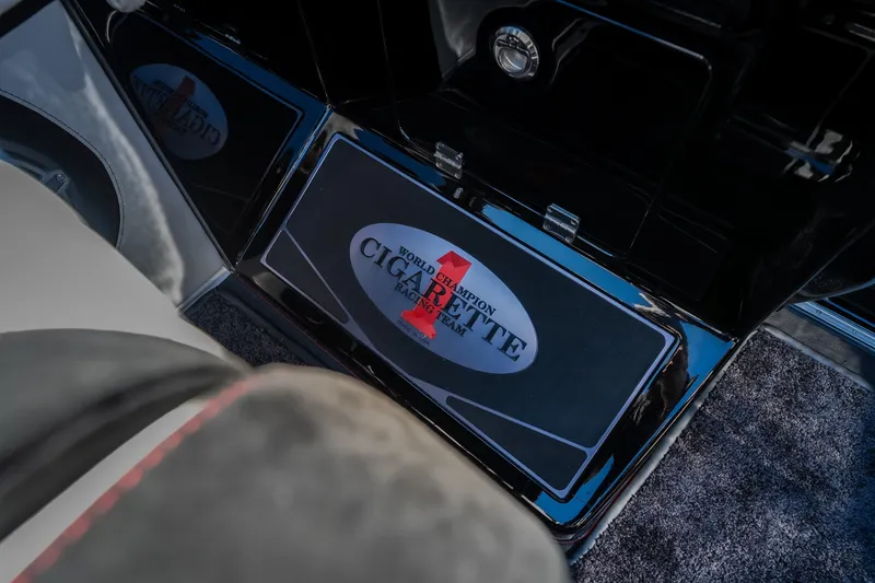 Slide: The Image of 2023 Cigarette 515 interior detail with "World Champion Cigarette Racing Team" logo. - 56