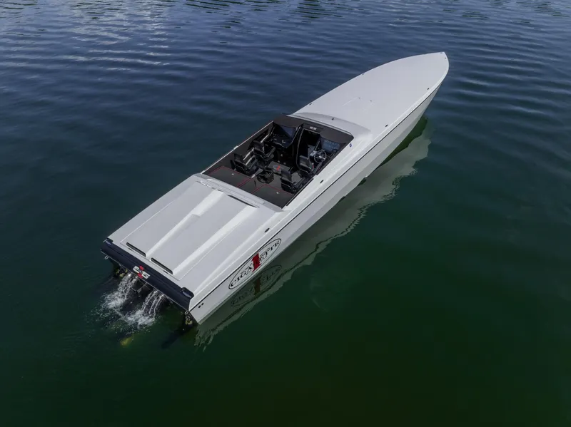 Slide: The Image of 2023 Cigarette 515 speedboat cruising on calm water, aerial view. - 14
