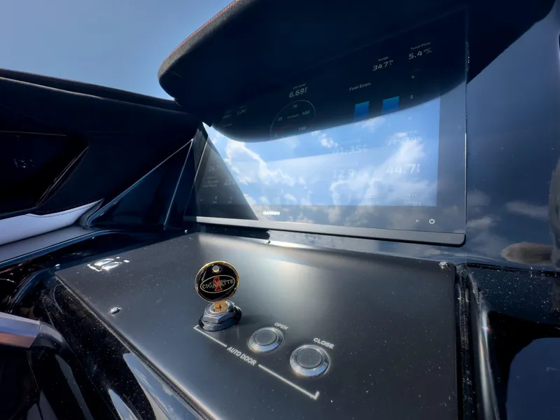 Slide: The Image of Dashboard of 2023 Cigarette 515 boat with touchscreen and control buttons. - 21