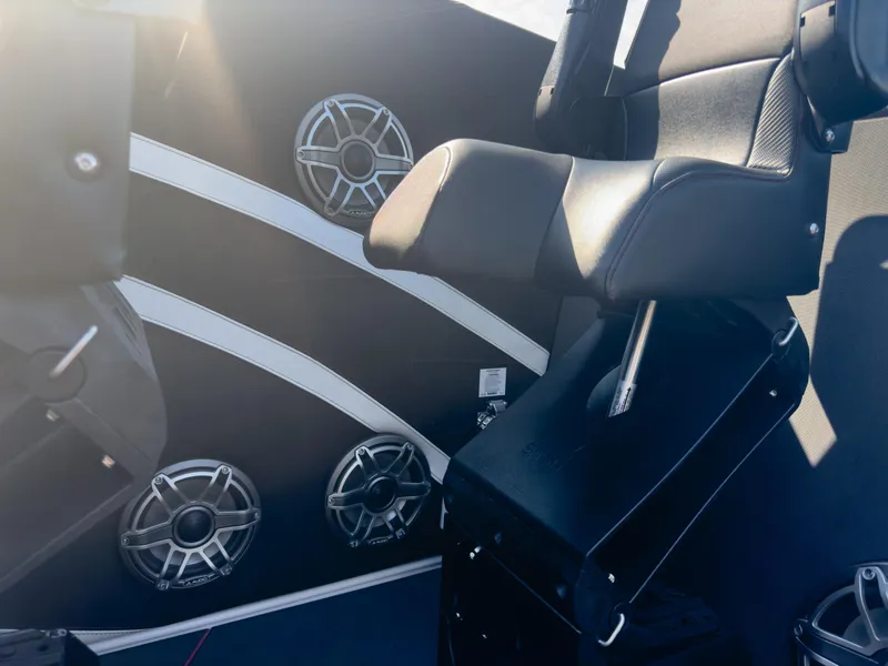 Slide: The Image of 2023 Cigarette 515 boat interior with sleek seating and modern speaker system. - 27