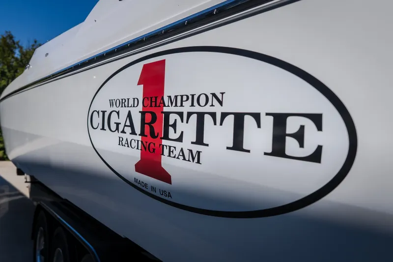 Slide: The Image of 2023 Cigarette 515 boat with "World Champion Racing Team" logo. - 26