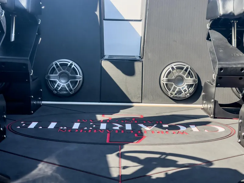 Slide: The Image of Interior of 2023 Cigarette 515 boat featuring premium speakers and seating. - 30